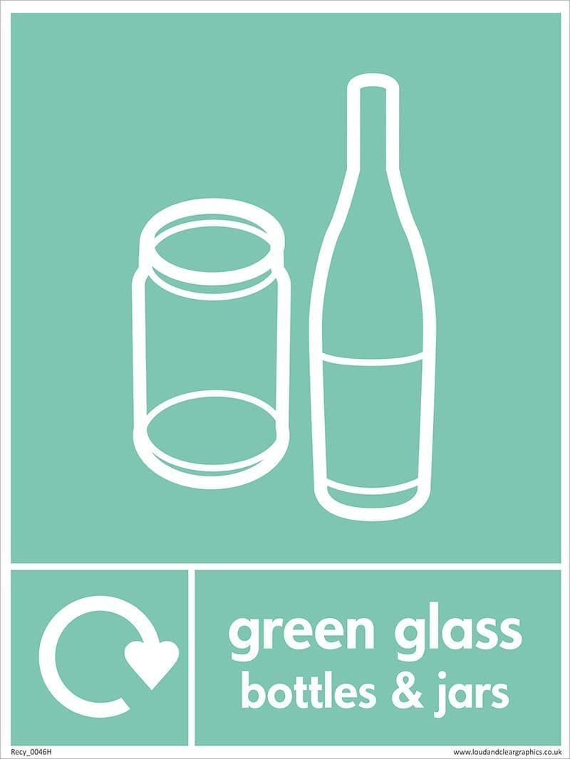 Green glass bottles and jars